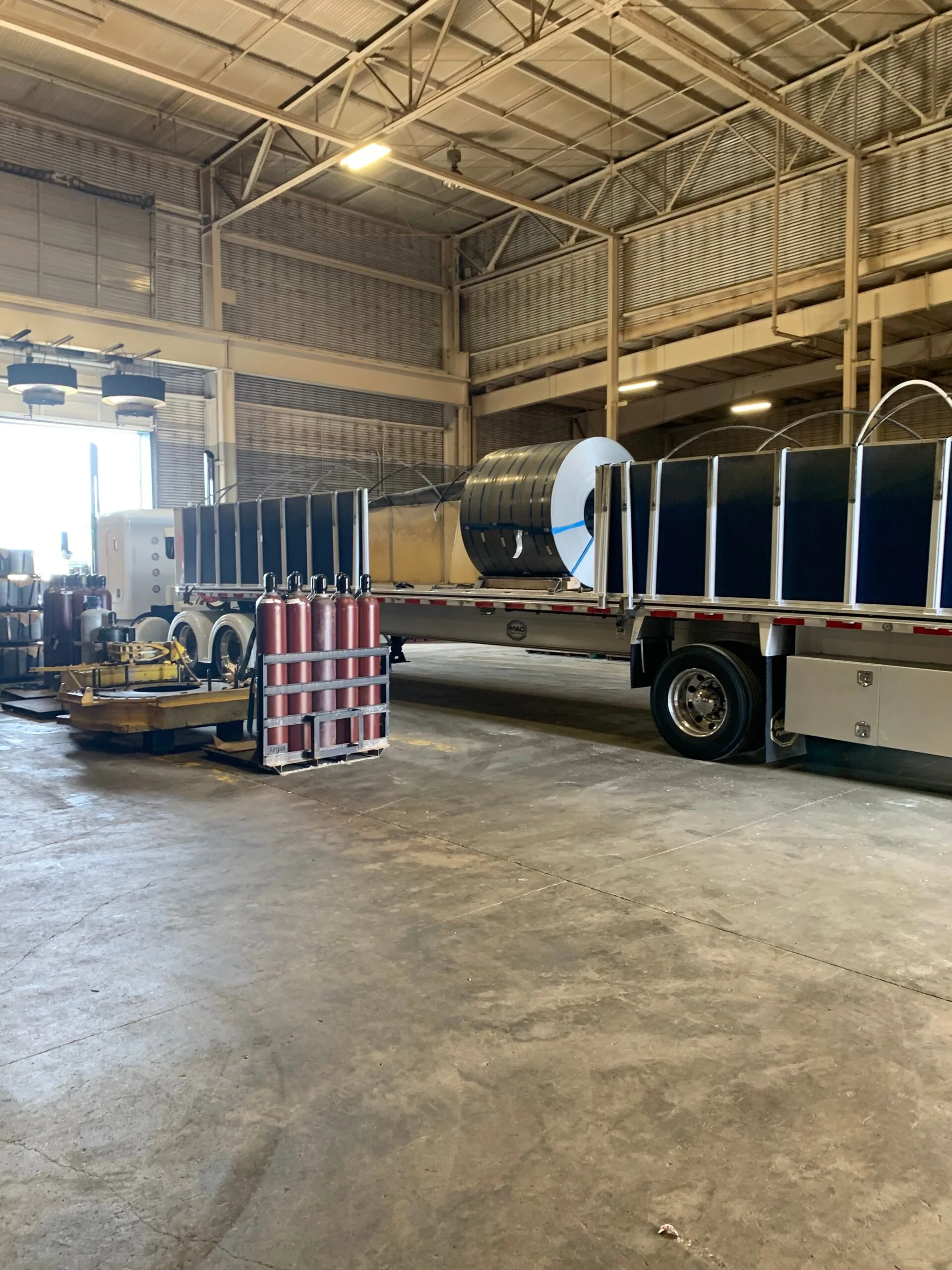 Hansen flatbed with steel coils secured