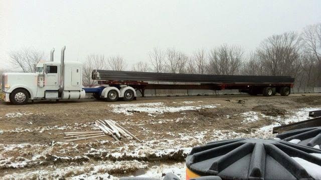 Hansen Peterbilt with flatbed steel load