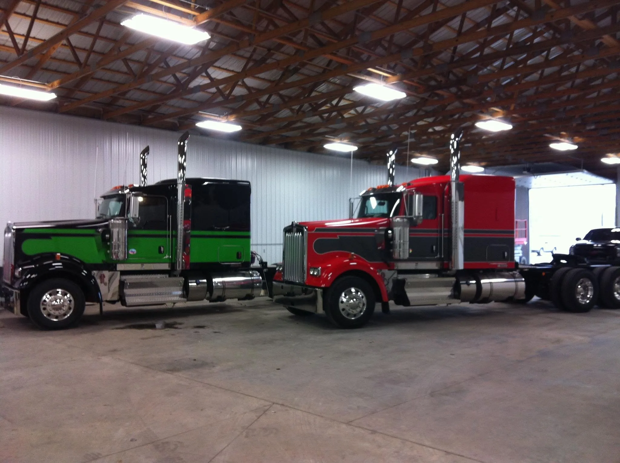 Two custom Hansen Kenworths in the maintenance shop